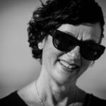 About woman, model, sunglasses, smile, short hair, expression